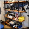 F43. Industrial style bookshelf. 75”h x 63”w x 16”d 